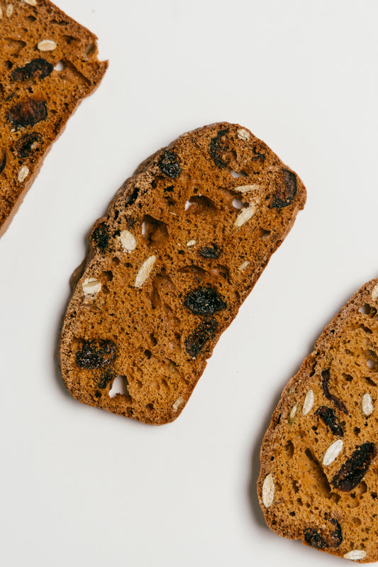 Close-up of Zammo’s Biscotti Crackers "Perfect with Cheese" slices – handcrafted in Hong Kong.